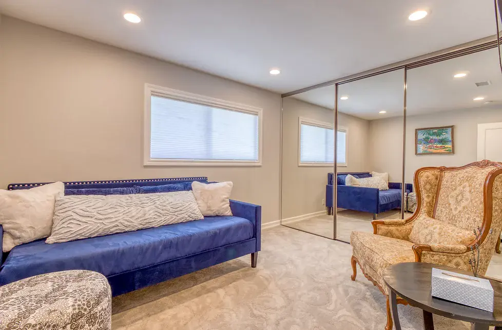 California Care's mental health residential bedroom with long blue couch