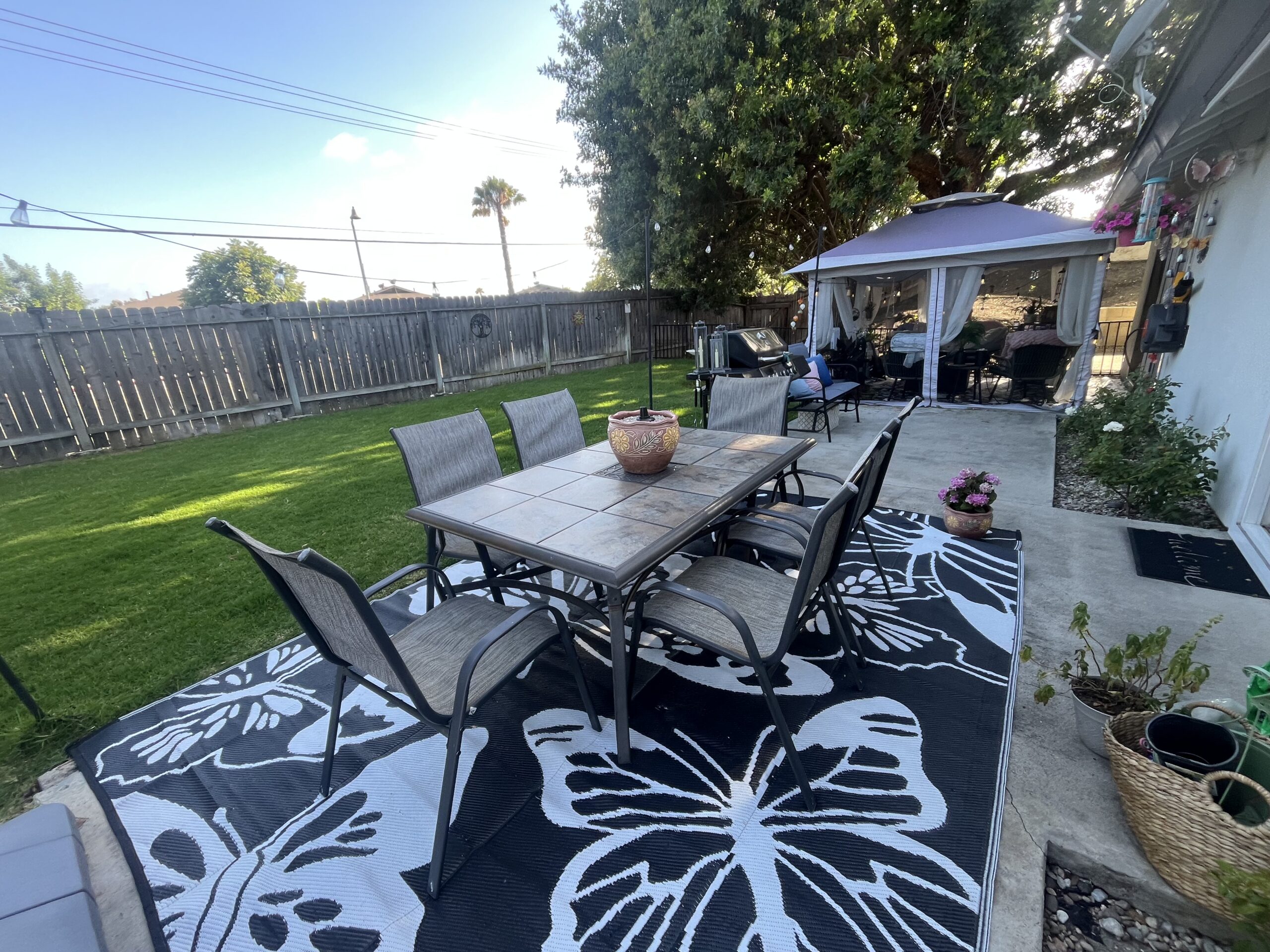 Backyard patio and lawn at our transitional living home in San Juan Capistrano